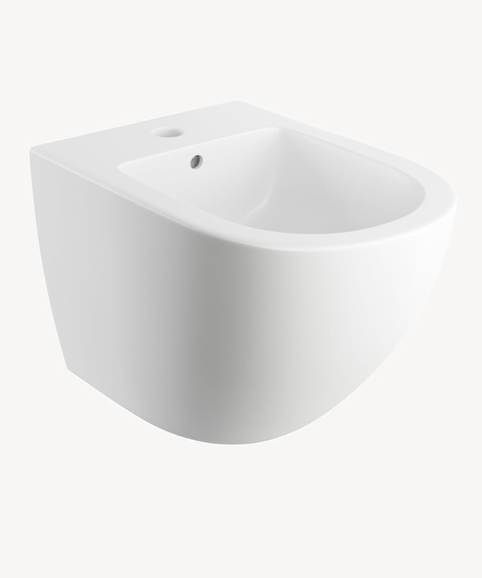 Bidet suspendu blanc, au design moderne, avec trop plein, installée dans une salle de bain équipée également d'un wc suspendu