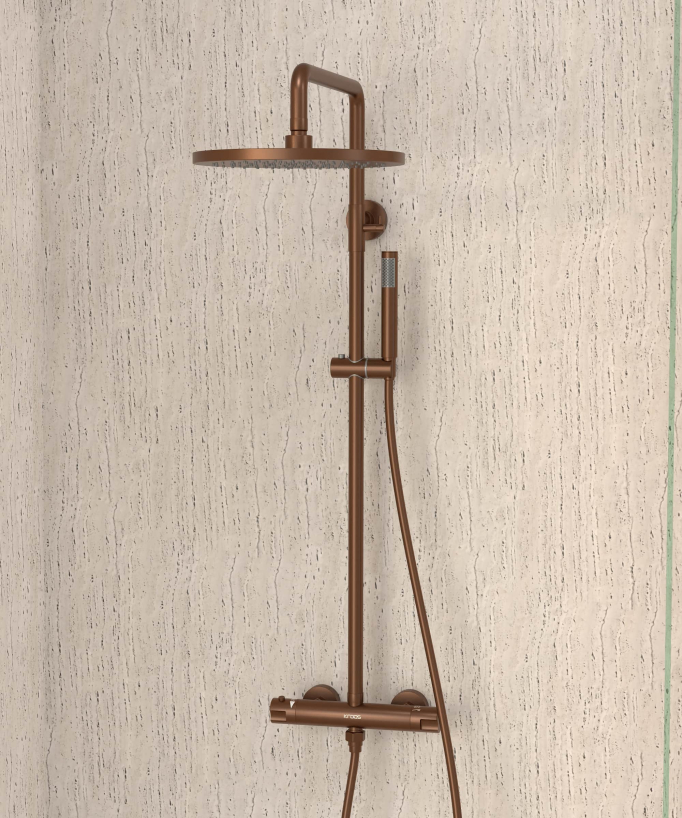 Colonne de douche thermostatique de forme ronde en finition or rose brossé de la collection Corbeau